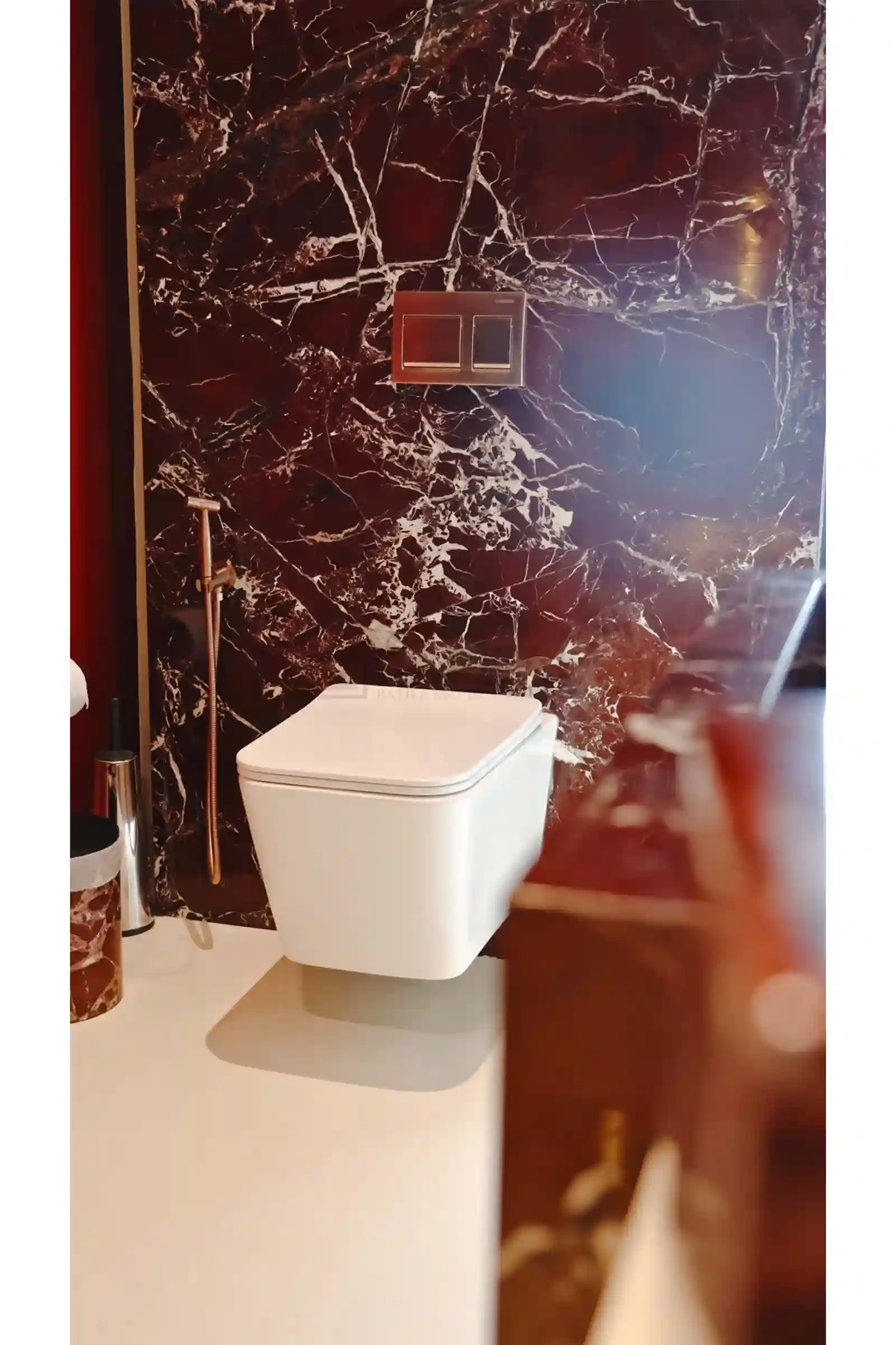 Wall-Hung Toilet Suite with Brushed Brass Flush Plate and Porcelain Slab